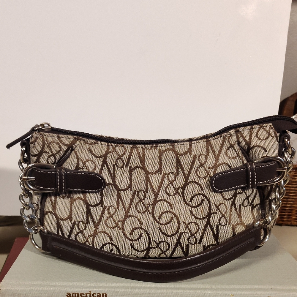 New York & company elongated bag with silver hardware very good condition